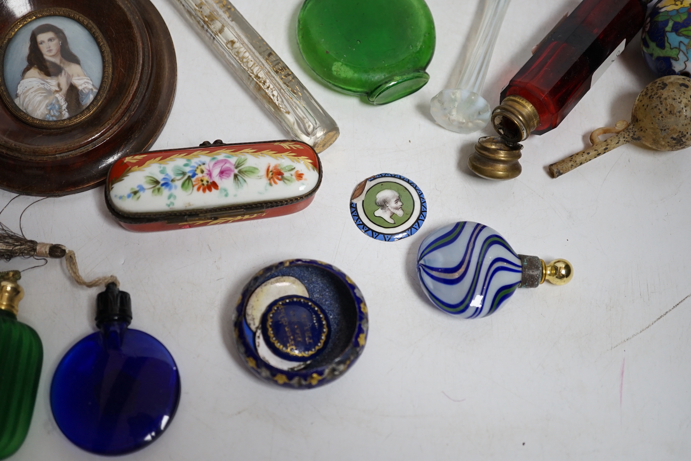 A collection of scent bottles, a miniature antiquity vessel and a miniature of a lady